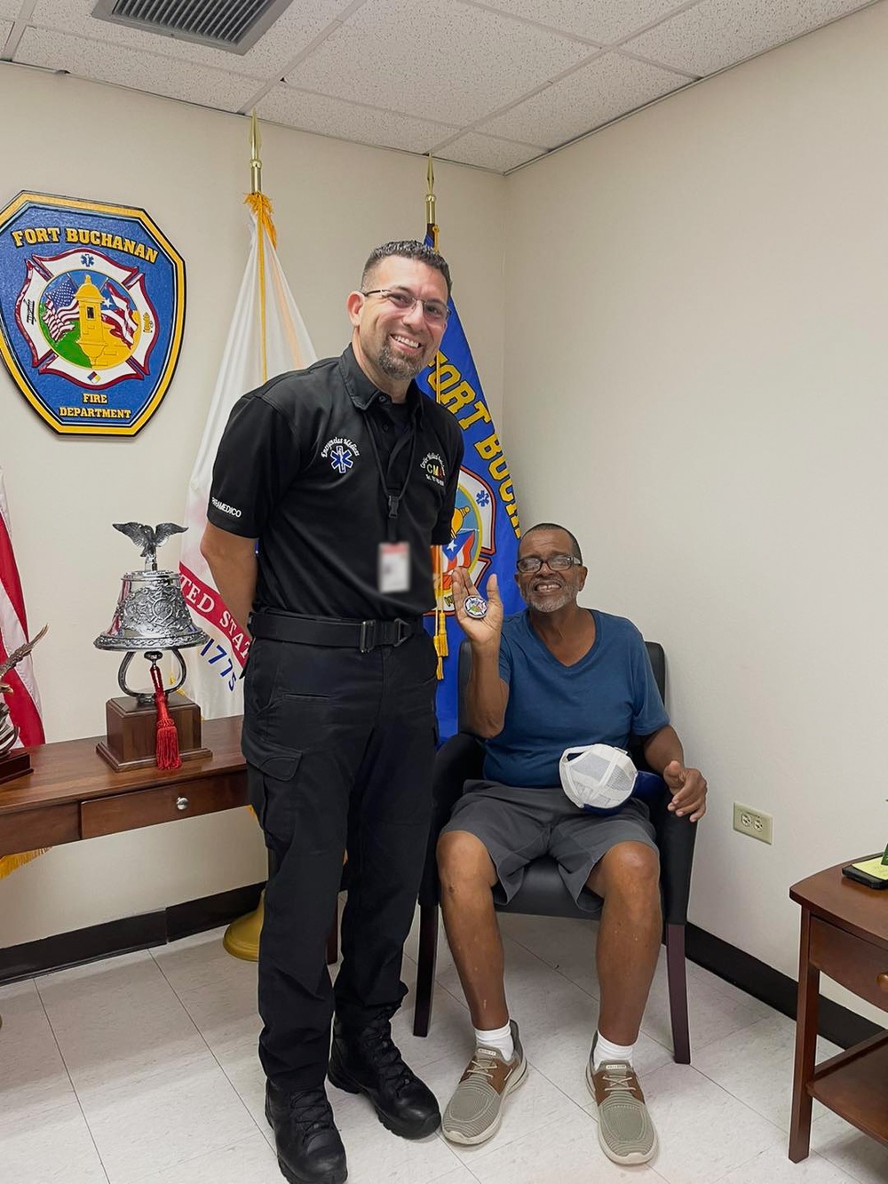 Veteran Reunites with Fort Buchanan paramedic who saved his life