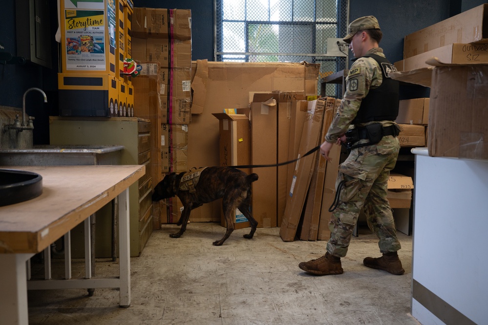 Military working dog handlers team up for joint training on JBPHH