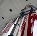 U.S. Flags are Hung in the Memorial Amphitheater in Preparation for the 2024 National Veterans Day Observance