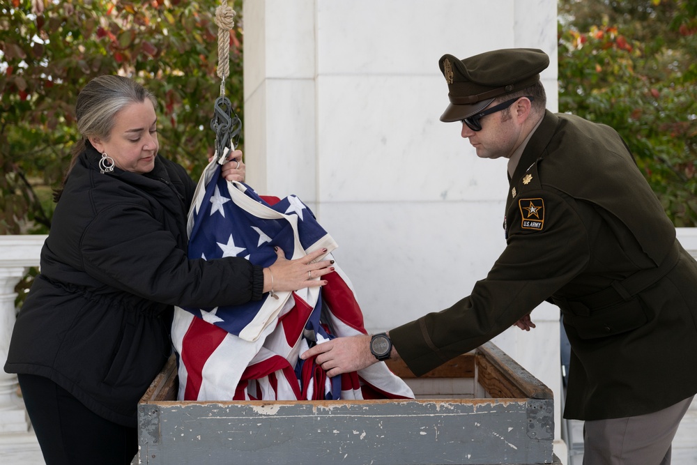 U.S. Flags are Hung in the Memorial Amphitheater in Preparation for the 2024 National Veterans Day Observance