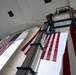 U.S. Flags are Hung in the Memorial Amphitheater in Preparation for the 2024 National Veterans Day Observance