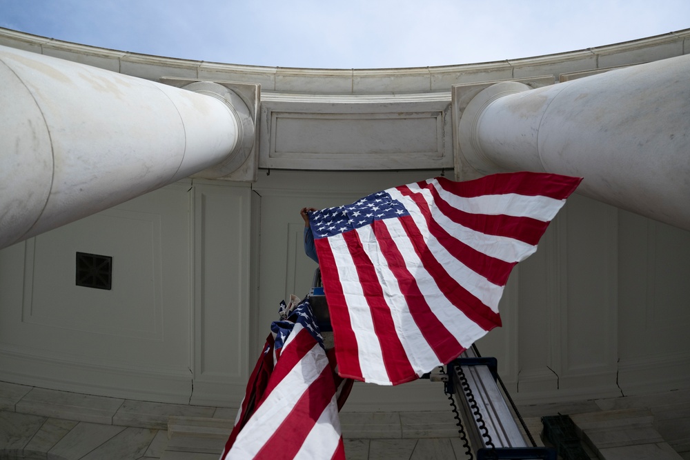 U.S. Flags are Hung in the Memorial Amphitheater in Preparation for the 2024 National Veterans Day Observance