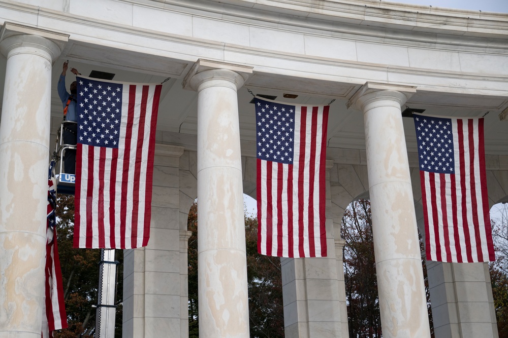 U.S. Flags are Hung in the Memorial Amphitheater in Preparation for the 2024 National Veterans Day Observance