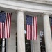 U.S. Flags are Hung in the Memorial Amphitheater in Preparation for the 2024 National Veterans Day Observance