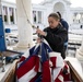 U.S. Flags are Hung in the Memorial Amphitheater in Preparation for the 2024 National Veterans Day Observance