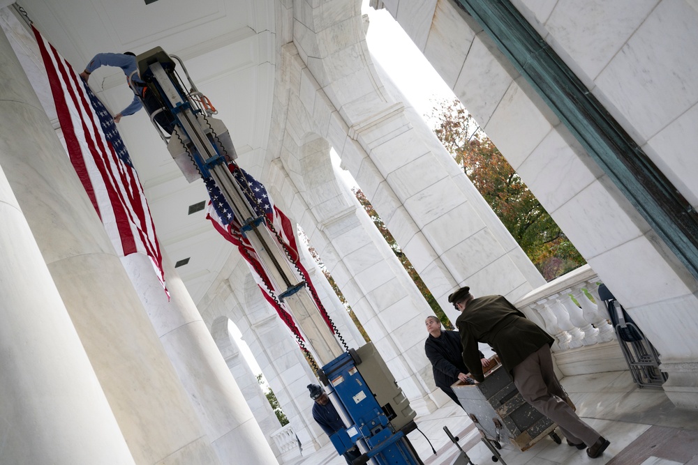 U.S. Flags are Hung in the Memorial Amphitheater in Preparation for the 2024 National Veterans Day Observance