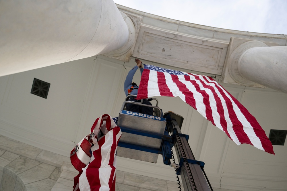 U.S. Flags are Hung in the Memorial Amphitheater in Preparation for the 2024 National Veterans Day Observance