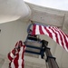 U.S. Flags are Hung in the Memorial Amphitheater in Preparation for the 2024 National Veterans Day Observance