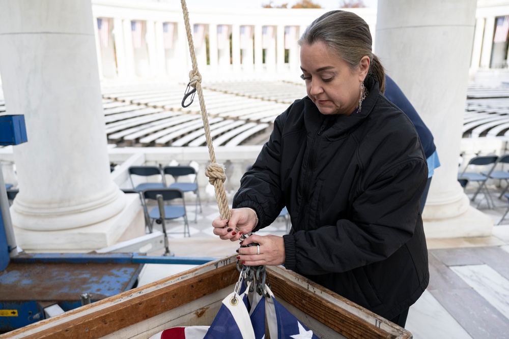 U.S. Flags are Hung in the Memorial Amphitheater in Preparation for the 2024 National Veterans Day Observance