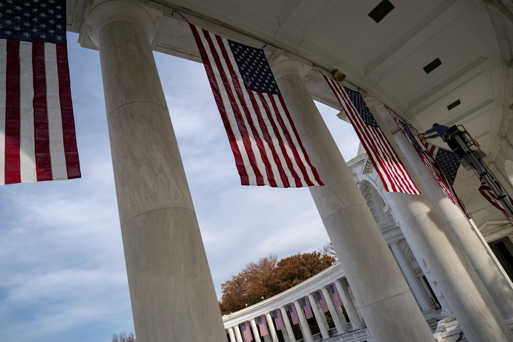 U.S. Flags are Hung in the Memorial Amphitheater in Preparation for the 2024 National Veterans Day Observance