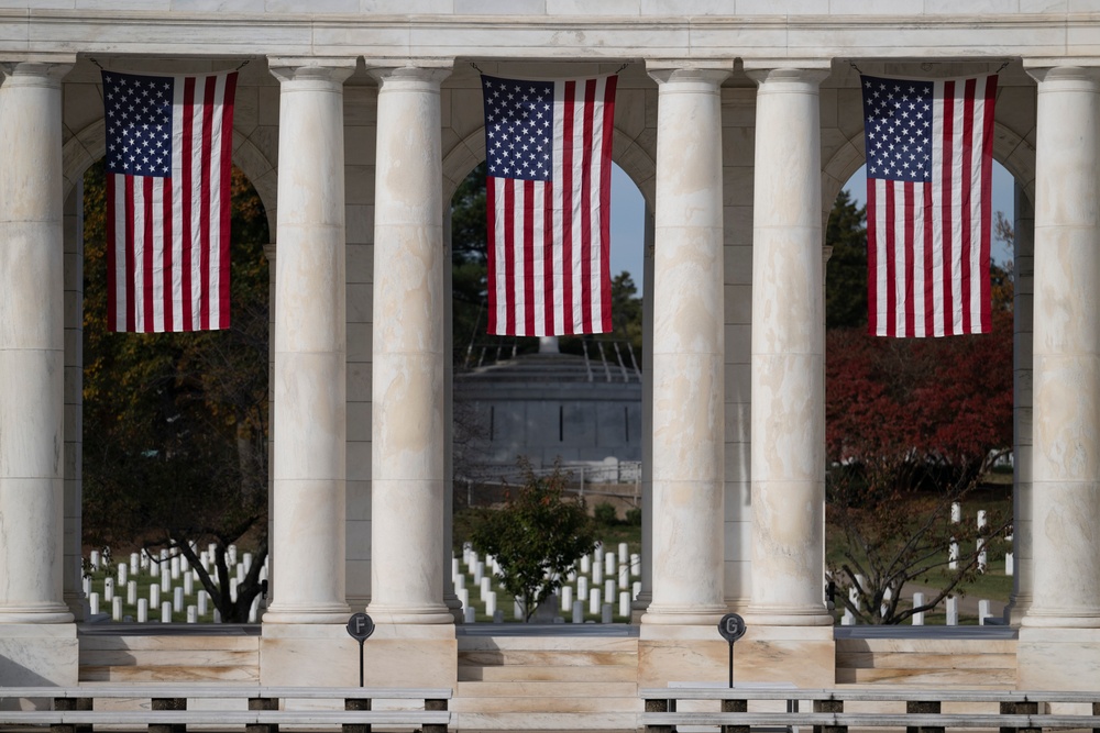 U.S. Flags are Hung in the Memorial Amphitheater in Preparation for the 2024 National Veterans Day Observance