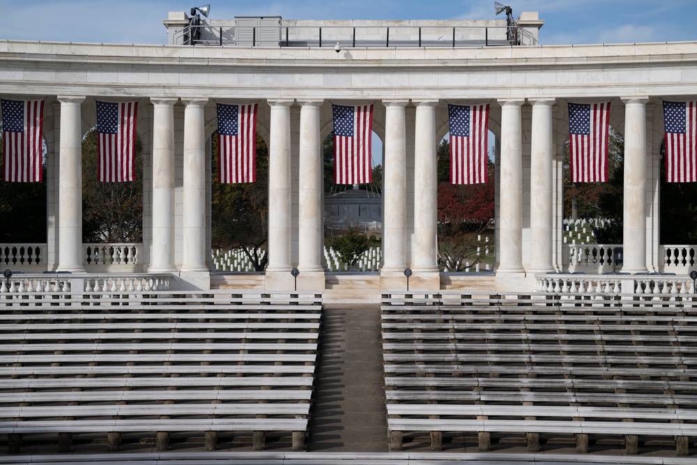 U.S. Flags are Hung in the Memorial Amphitheater in Preparation for the 2024 National Veterans Day Observance