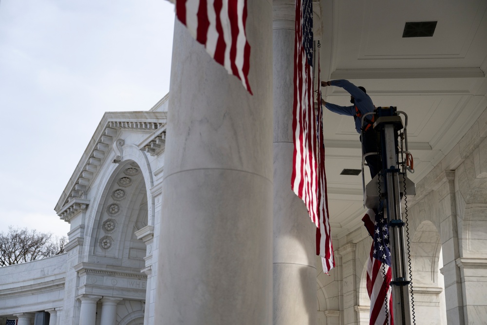 U.S. Flags are Hung in the Memorial Amphitheater in Preparation for the 2024 National Veterans Day Observance