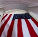 U.S. Flags are Hung in the Memorial Amphitheater in Preparation for the 2024 National Veterans Day Observance