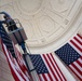 U.S. Flags are Hung in the Memorial Amphitheater in Preparation for the 2024 National Veterans Day Observance