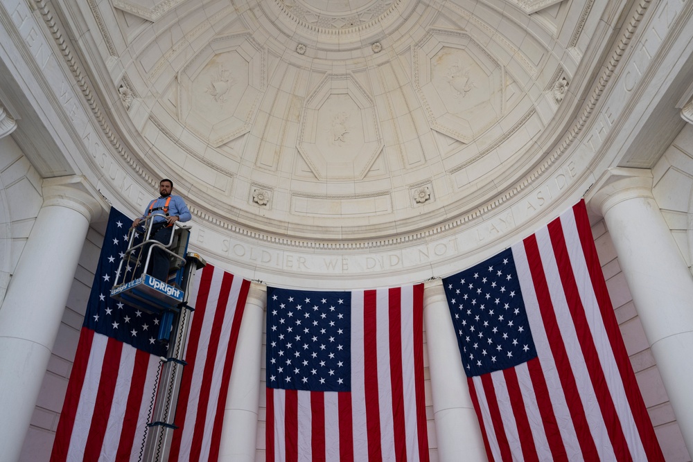 U.S. Flags are Hung in the Memorial Amphitheater in Preparation for the 2024 National Veterans Day Observance