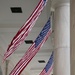 U.S. Flags are Hung in the Memorial Amphitheater in Preparation for the 2024 National Veterans Day Observance