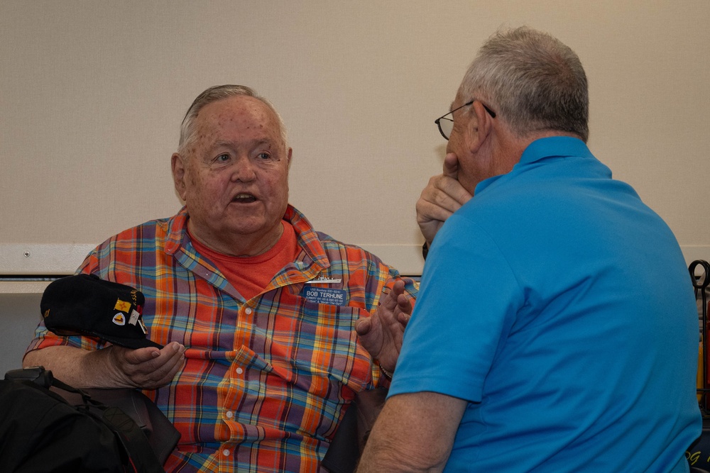 Sailors with USS John Basilone DDG 122 Meet with Retired Service Members of USS Basilone DDE 824