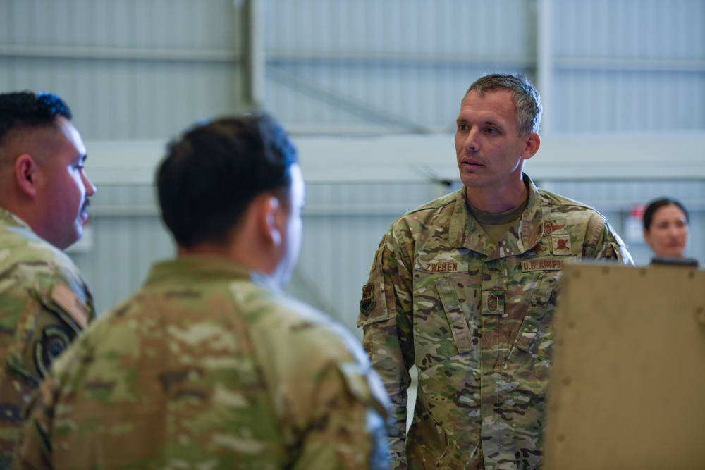 California ANG Command Chief Visits 163d Attack Wing, Coins Airman for Excellence