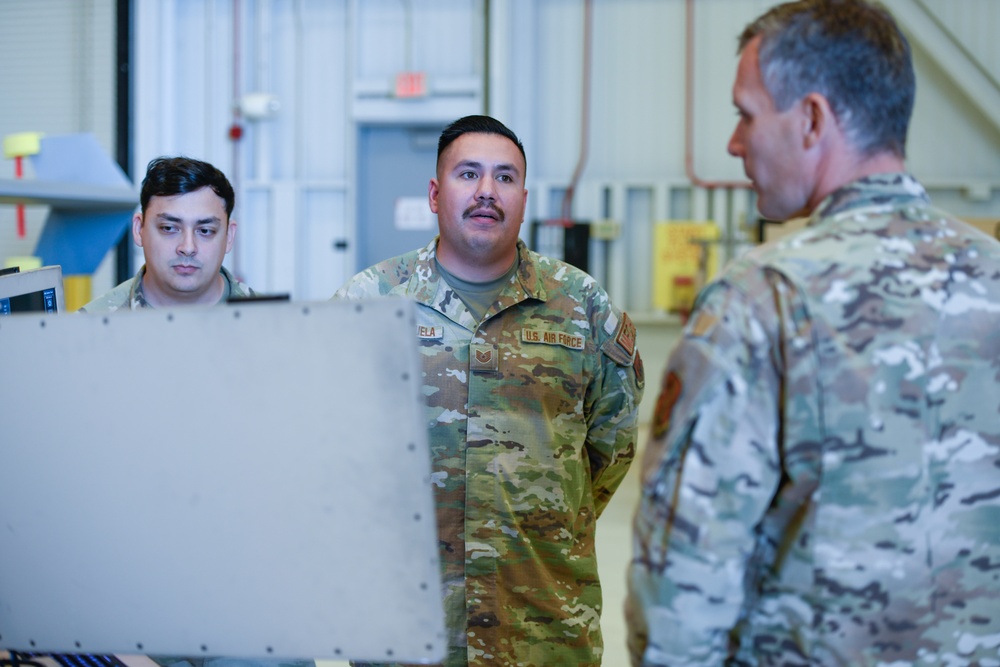 California ANG Command Chief Visits 163d Attack Wing, Coins Airman for Excellence