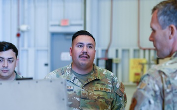 California ANG Command Chief Visits 163d Attack Wing, Coins Airman for Excellence