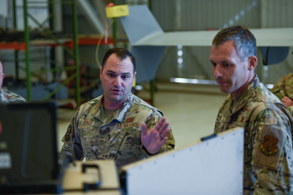 California ANG Command Chief Visits 163d Attack Wing, Coins Airman for Excellence