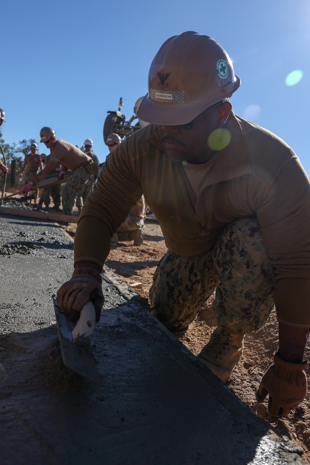 NMCB 4 Seabees Place Concrete for Ft. Hunter Liggett Pistol Qualification Range