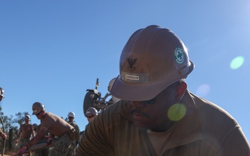 NMCB 4 Seabees Place Concrete for Ft. Hunter Liggett Pistol Qualification Range