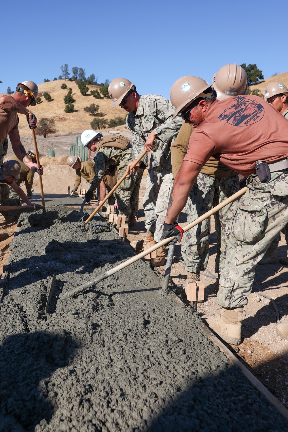 NMCB 4 Seabees Place Concrete for Ft. Hunter Liggett Pistol Qualification Range