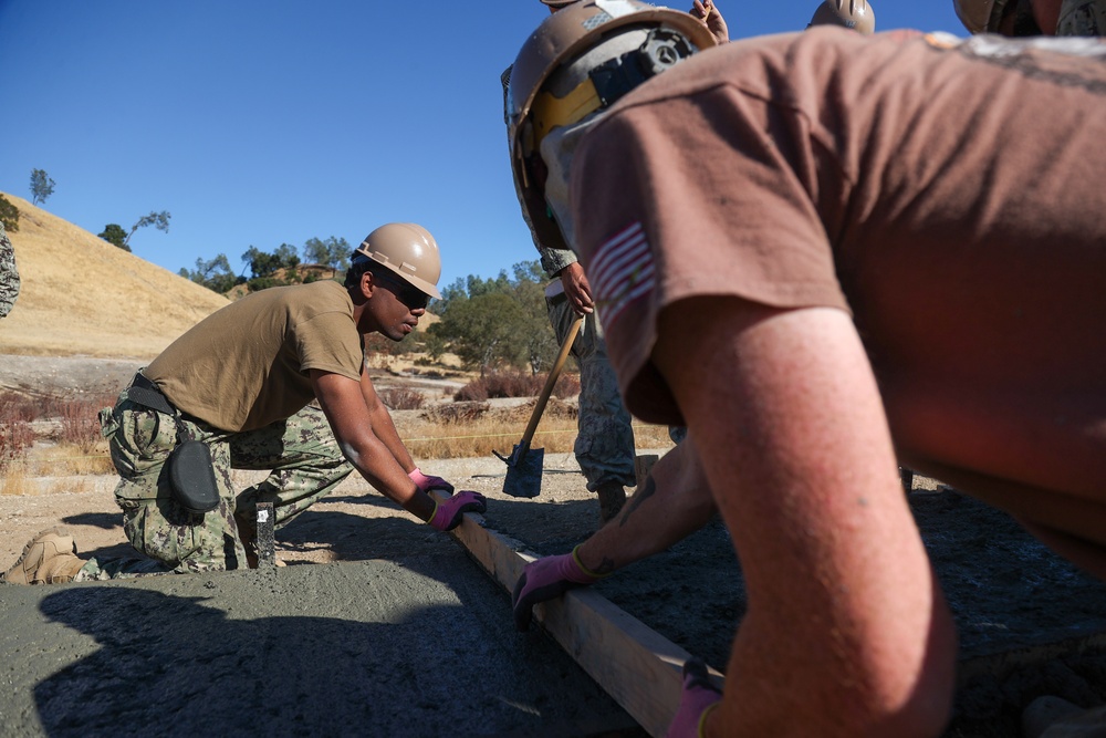 NMCB 4 Seabees Place Concrete for Ft. Hunter Liggett Pistol Qualification Range