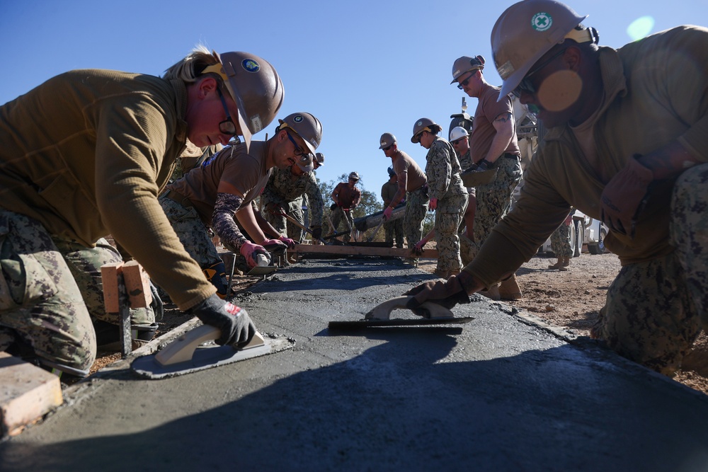 NMCB 4 Seabees Place Concrete for Ft. Hunter Liggett Pistol Qualification Range