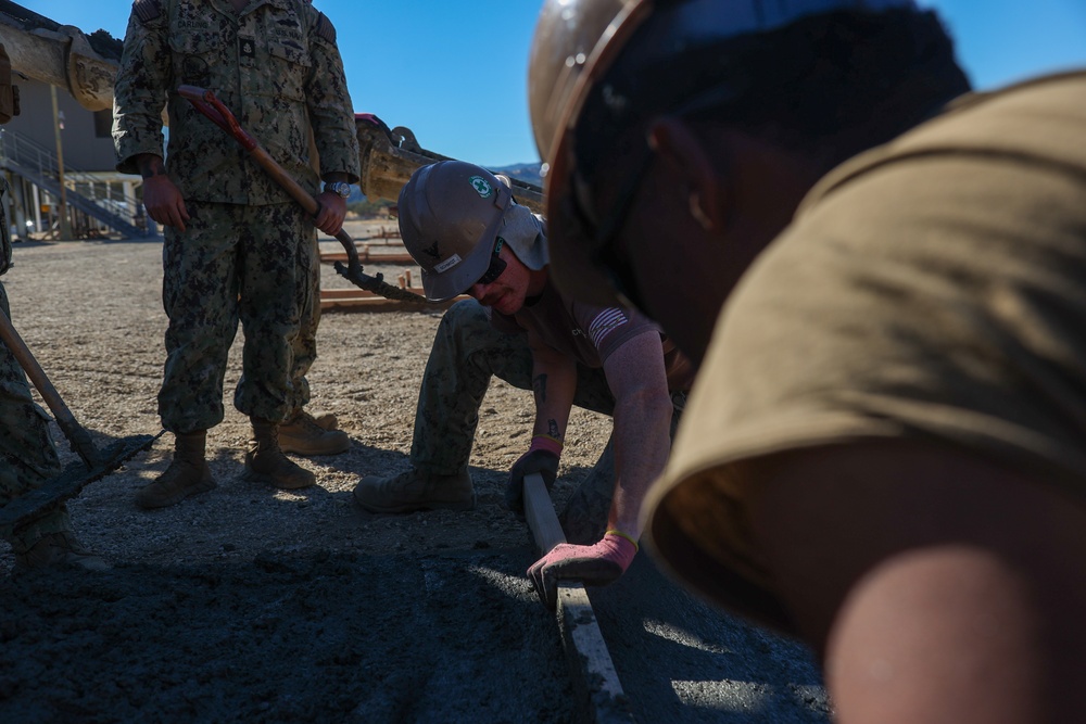 NMCB 4 Seabees Place Concrete for Ft. Hunter Liggett Pistol Qualification Range