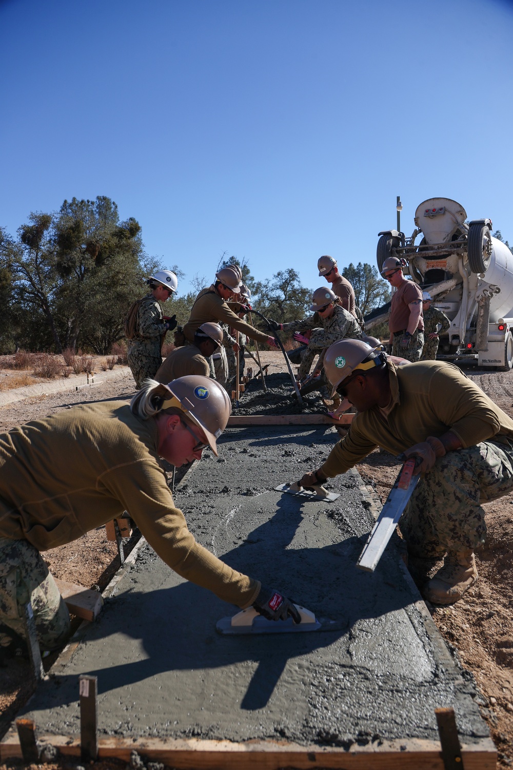 NMCB 4 Seabees Place Concrete for Ft. Hunter Liggett Pistol Qualification Range