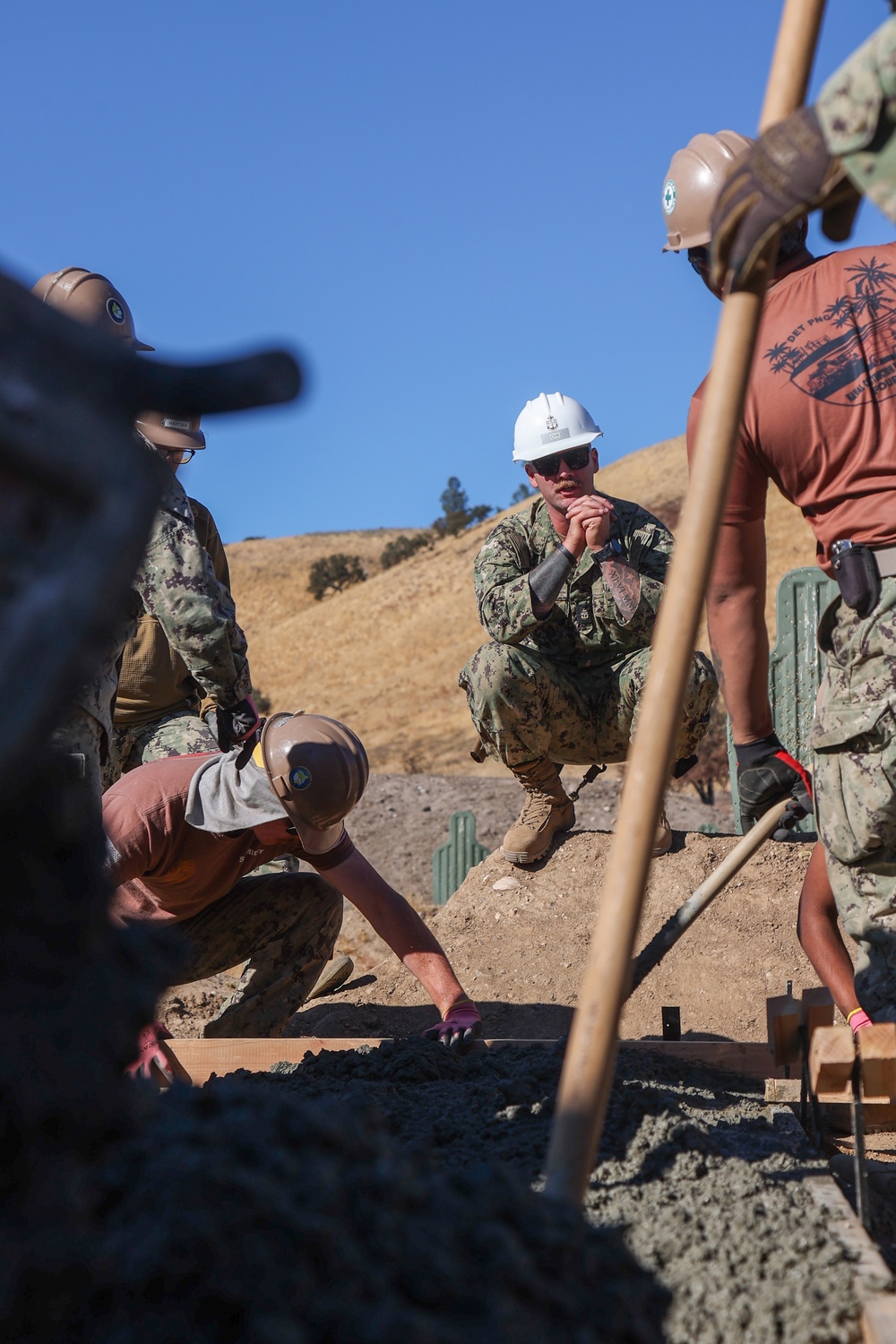 NMCB 4 Seabees Place Concrete for Ft. Hunter Liggett Pistol Qualification Range