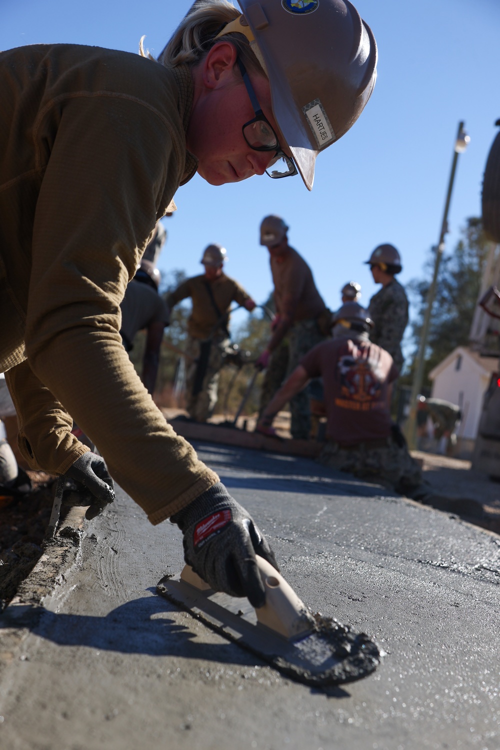 NMCB 4 Seabees Place Concrete for Ft. Hunter Liggett Pistol Qualification Range