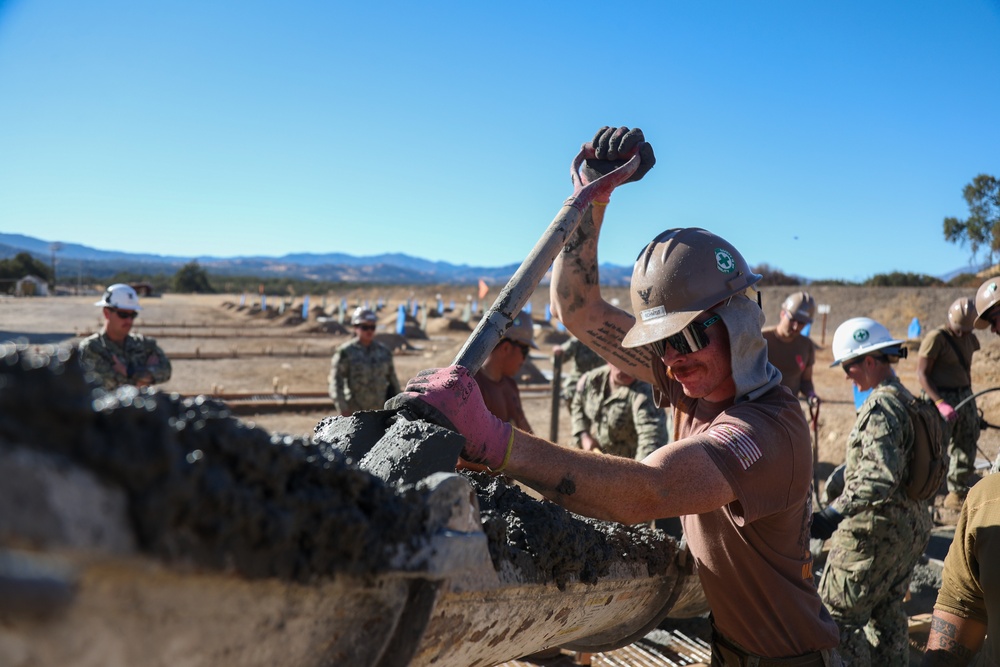 NMCB 4 Seabees Place Concrete for Ft. Hunter Liggett Pistol Qualification Range