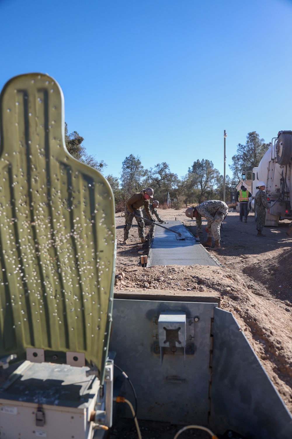 NMCB 4 Seabees Place Concrete for Ft. Hunter Liggett Pistol Qualification Range