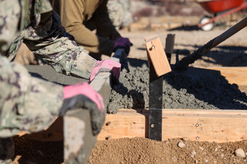 NMCB 4 Seabees Place Concrete for Ft. Hunter Liggett Pistol Qualification Range