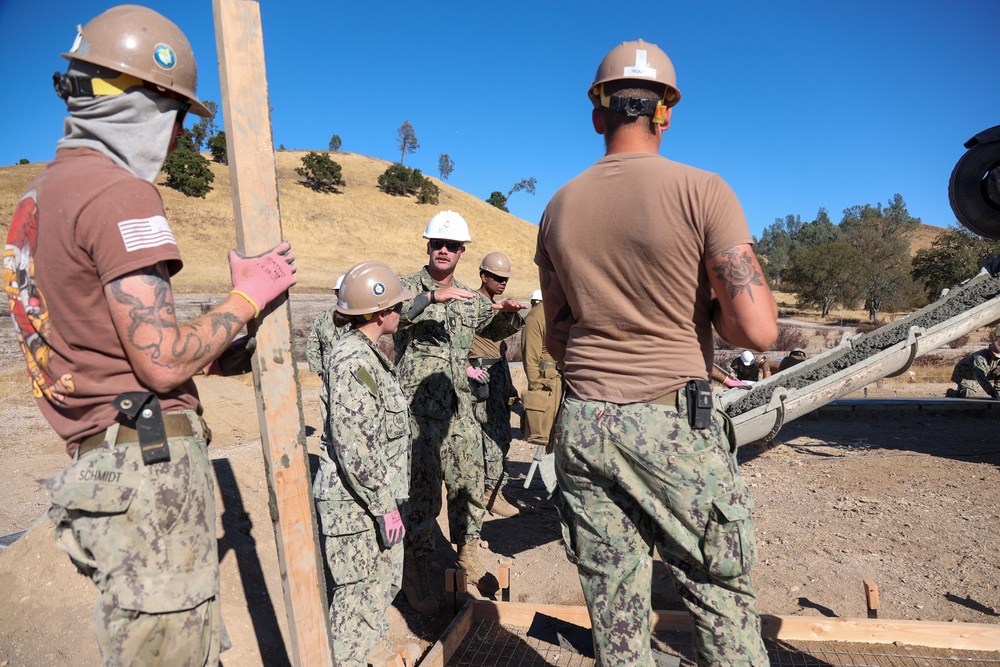 NMCB 4 Seabees Place Concrete for Ft. Hunter Liggett Pistol Qualification Range