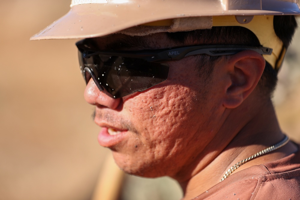 NMCB 4 Seabees Place Concrete for Ft. Hunter Liggett Pistol Qualification Range