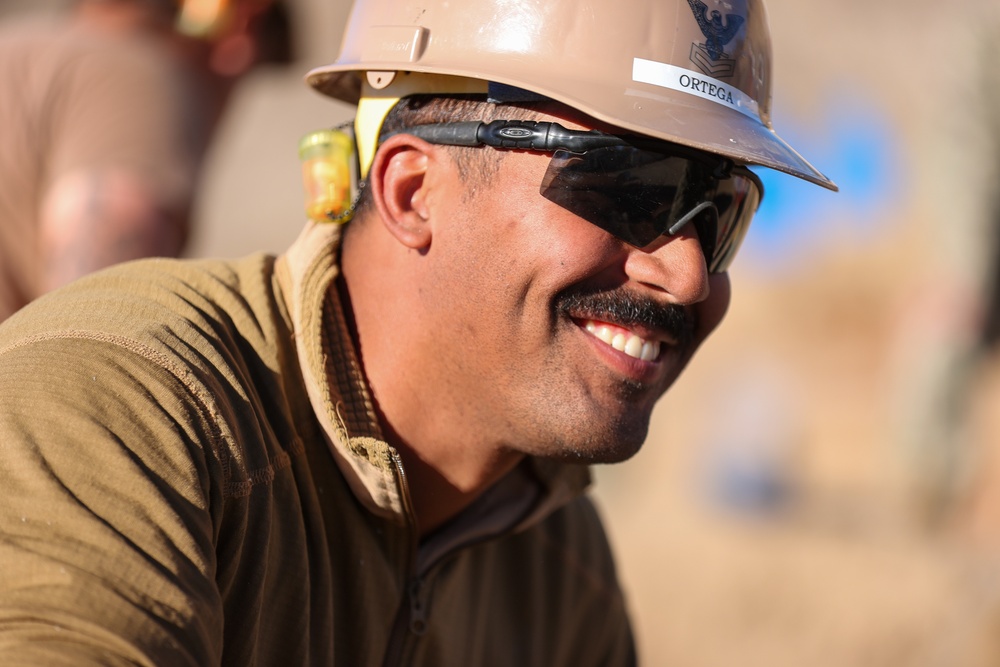 NMCB 4 Seabees Place Concrete for Ft. Hunter Liggett Pistol Qualification Range