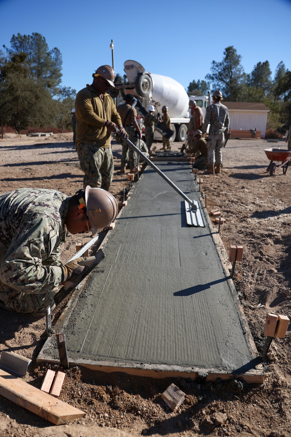 NMCB 4 Seabees Place Concrete for Ft. Hunter Liggett Pistol Qualification Range