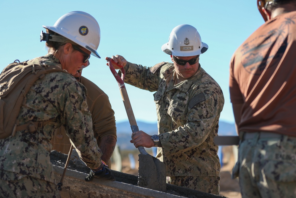 NMCB 4 Seabees Place Concrete for Ft. Hunter Liggett Pistol Qualification Range