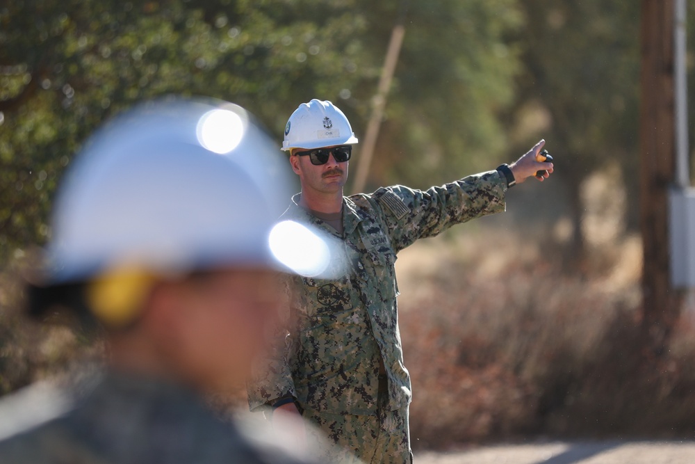 NMCB 4 Seabees Place Concrete for Ft. Hunter Liggett Pistol Qualification Range