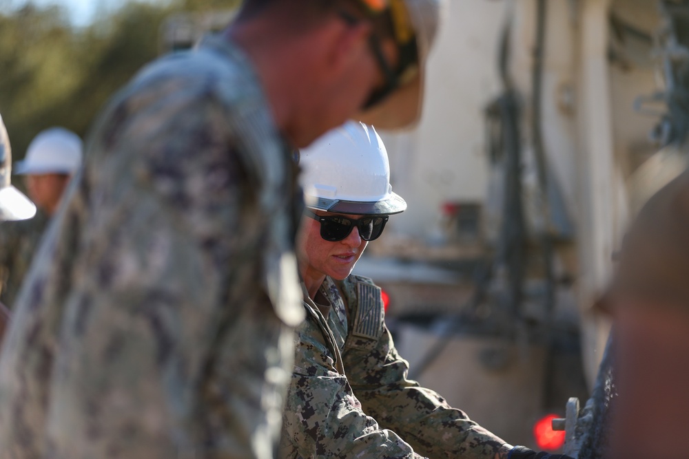 NMCB 4 Seabees Place Concrete for Ft. Hunter Liggett Pistol Qualification Range