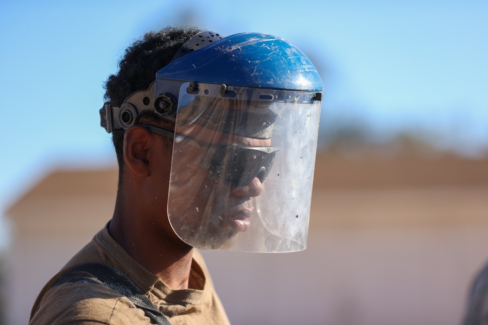 NMCB 4 Seabees Place Concrete for Ft. Hunter Liggett Pistol Qualification Range