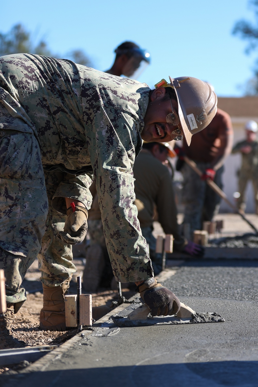 NMCB 4 Seabees Place Concrete for Ft. Hunter Liggett Pistol Qualification Range