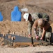 NMCB 4 Seabees Place Concrete for Ft. Hunter Liggett Pistol Qualification Range