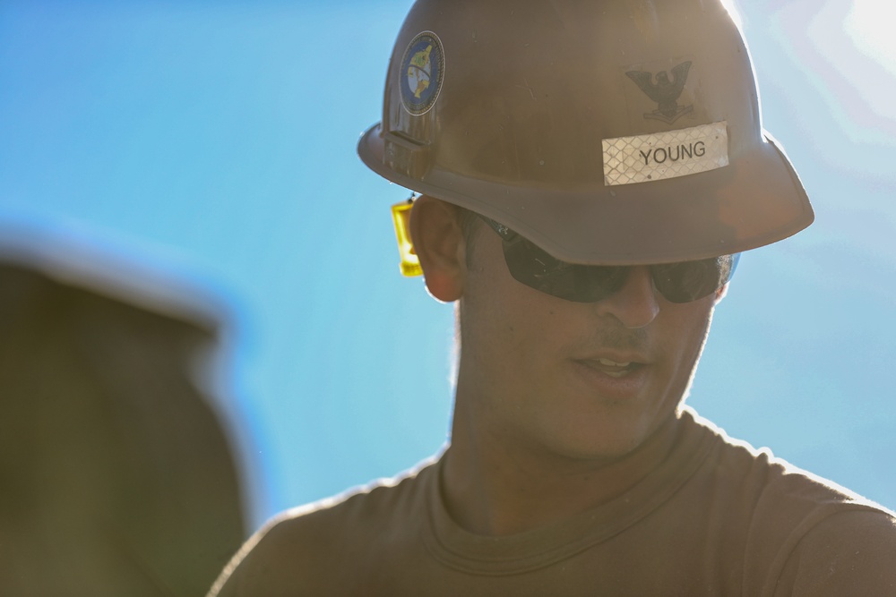 NMCB 4 Seabees Place Concrete for Ft. Hunter Liggett Pistol Qualification Range