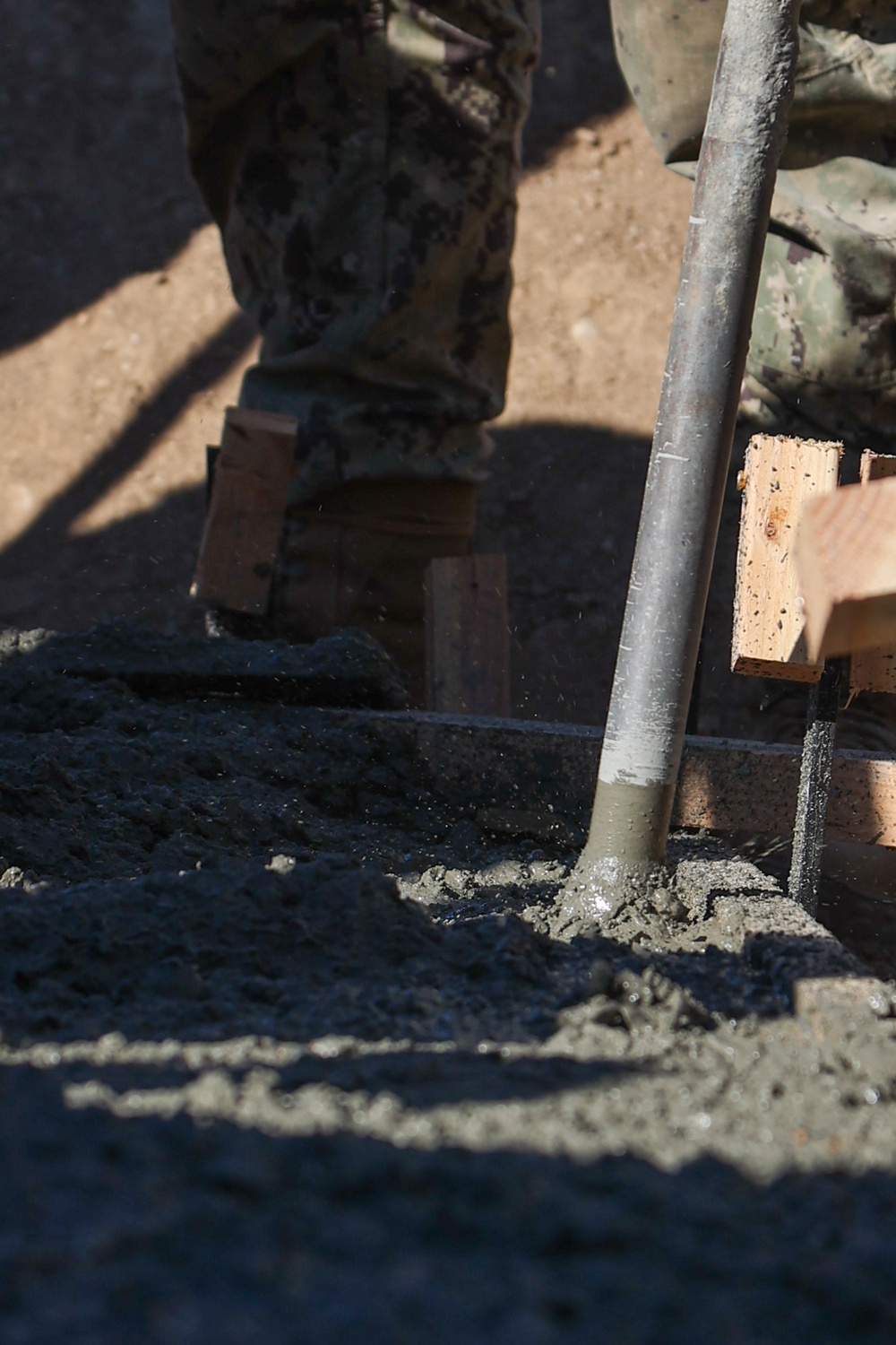 NMCB 4 Seabees Place Concrete for Ft. Hunter Liggett Pistol Qualification Range